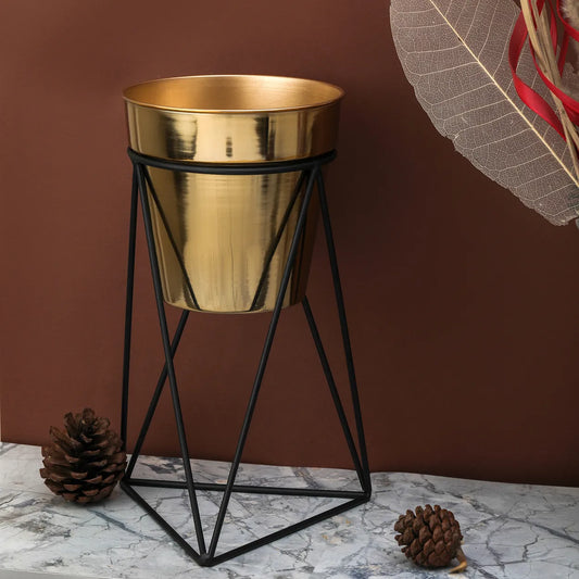 Golden pot with stand with brown background