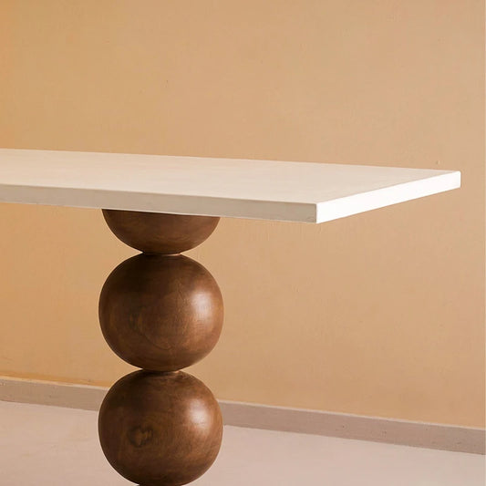 Dining table with wooden ball base