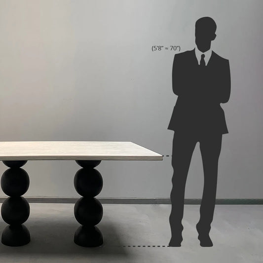 Height comparison of dining table with man