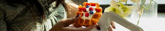 waffle candle in the hand
