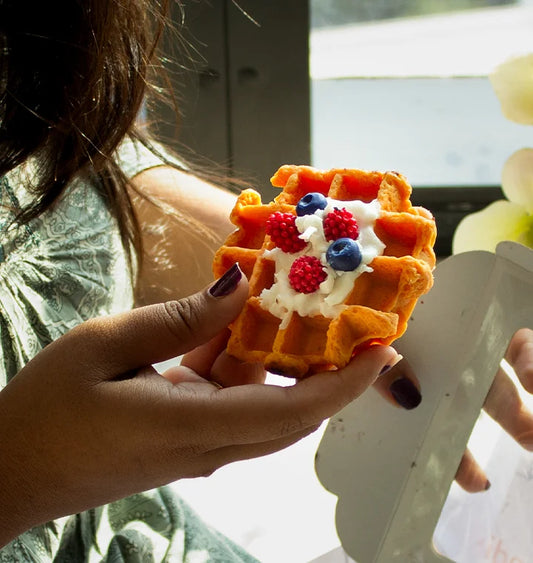 waffle candle in the hand