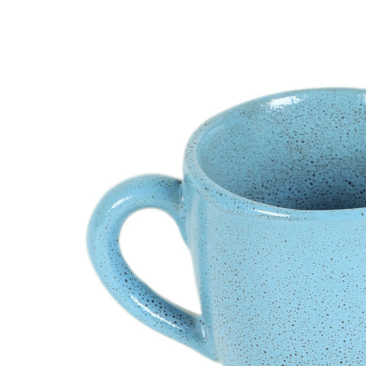 close up of blue tea cup