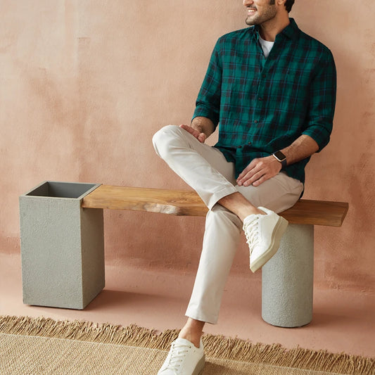 Man sitting on wooden bench 