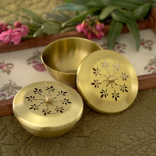 Set of two brass nut bowls