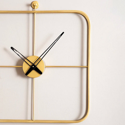 Gold color designer wall clock with black needles
