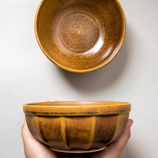 Mustard yellow bowls with classic design