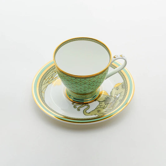 Tea cup and saucer set in pastel green 