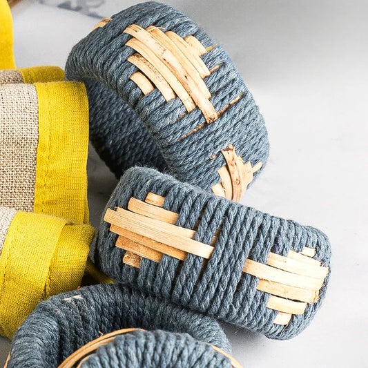 Blue yarn and rattan woven napkin rings