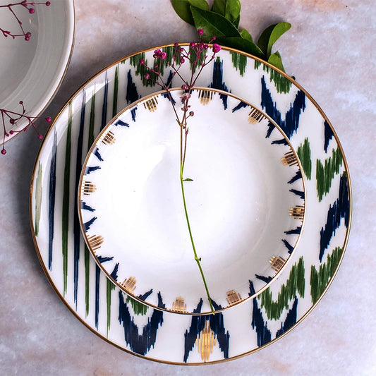 Porcelain bowl and quarter plate on table