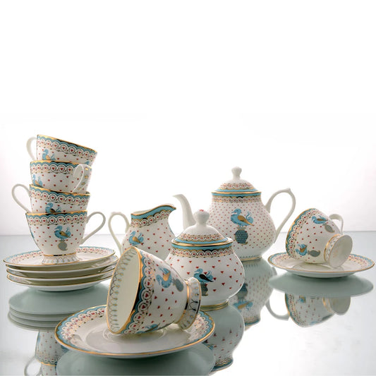 Tea set with turquoise blue and floral motifs design 