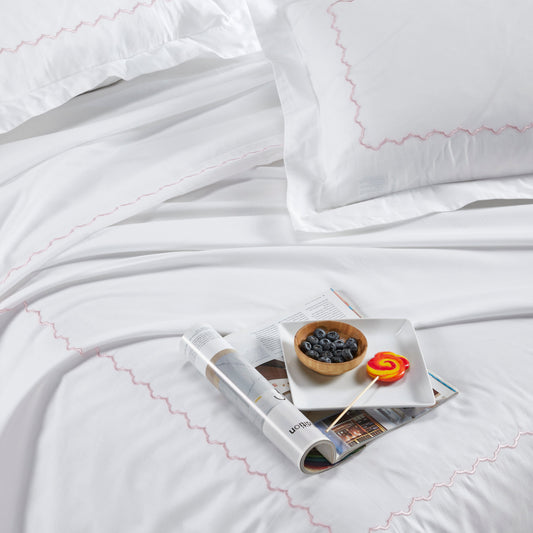 Plain white bedsheet and pillow cover