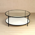 Glass table with matt black finish legs