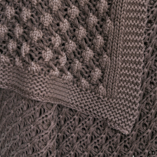 knitted brown cotton blanket