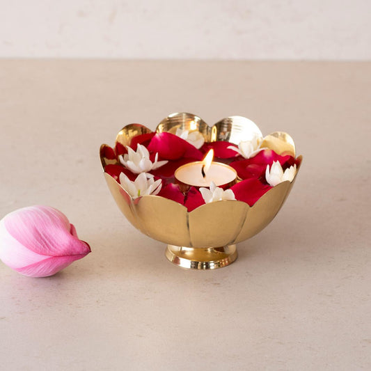 Brass Urli with flower decoration 