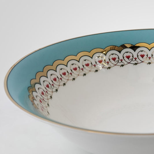Hand decorated turquoise blue bowl 