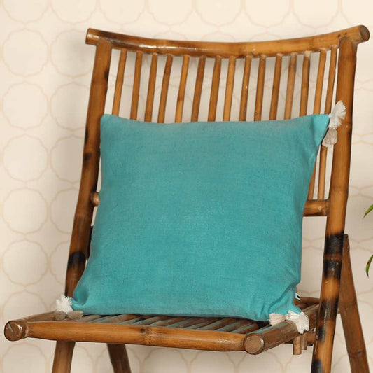 Sapphire cushion with pom pom