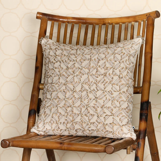 Cream throw pillow on wooden chair