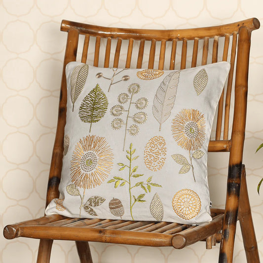 Square yellow cushion on wooden chair