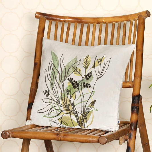 Leafy design cushion cover on chair