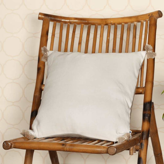 Ivory cushion on wooden chair