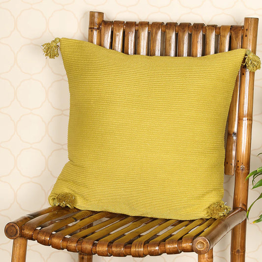 Dark yellow cushion cover on wooden chair