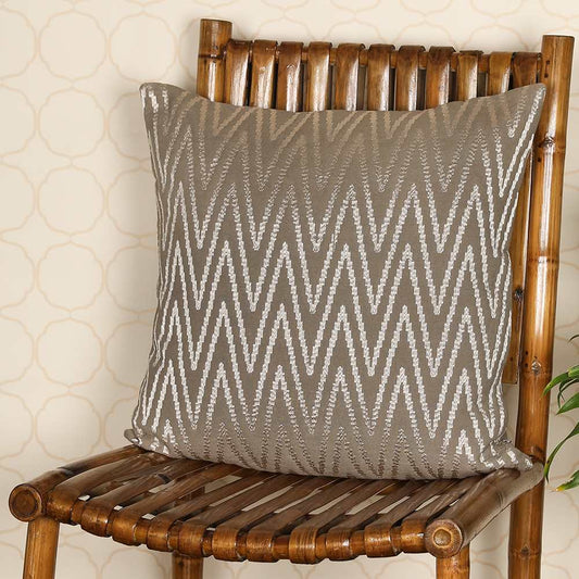 Light brown cushion on wooden chair