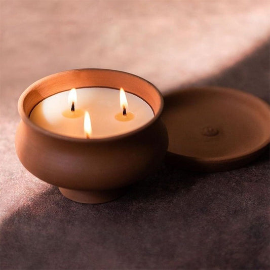 terracotta candle with three wicks
