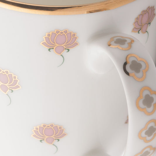 White coffee mug with pink lotus designs
