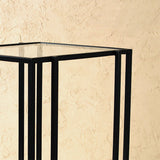Metal frame table with glass top
