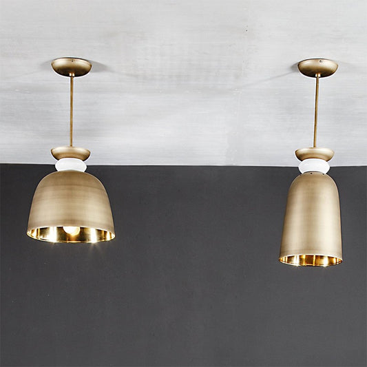 suspended bell-shaped brass pendant lights in two designs