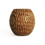 Carved spherical wood planter close up