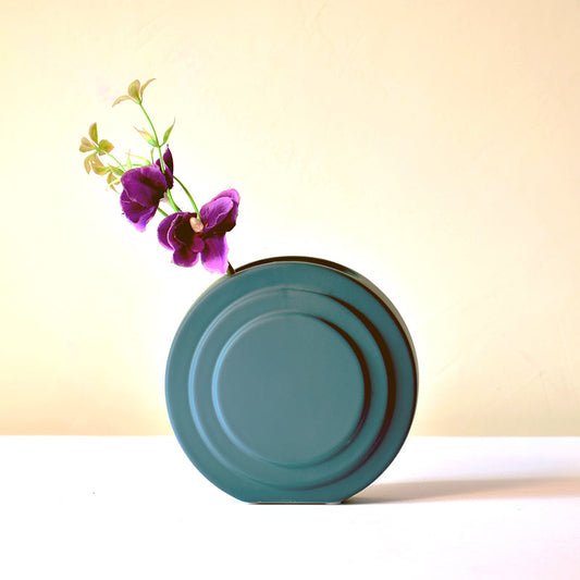 Round contour dark green flower vase