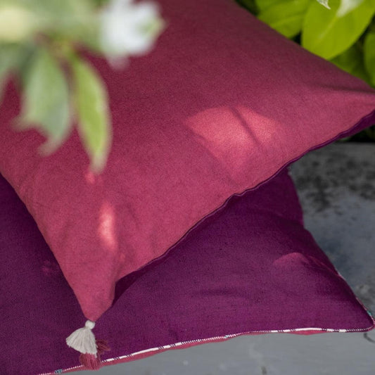 Purple cushion with tassels