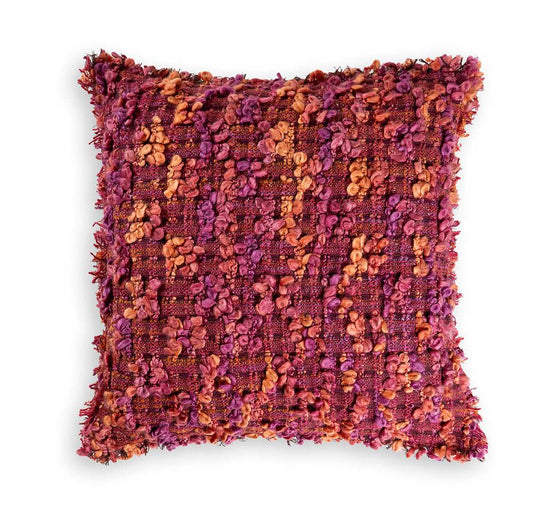 Purple throw pillow with fringe in square shape