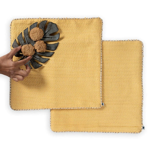 Two table napkins in yellow color