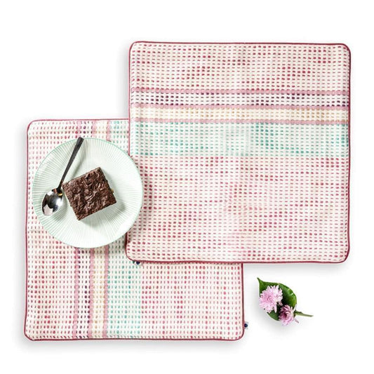 Set of two handwoven table mats in dotted design