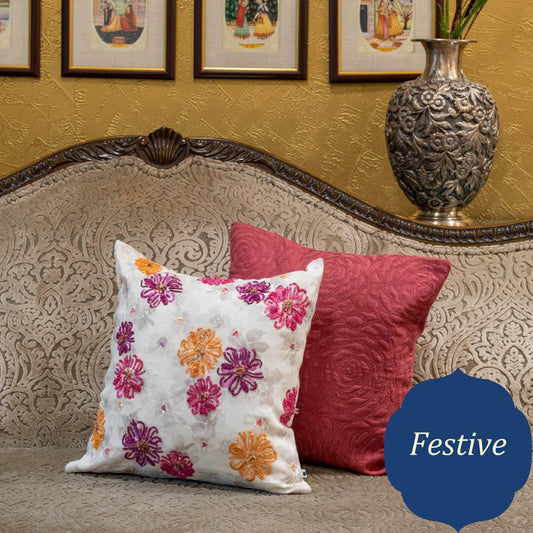 Set of two cushions with flower and rose design
