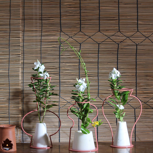 Three decorative flower vases