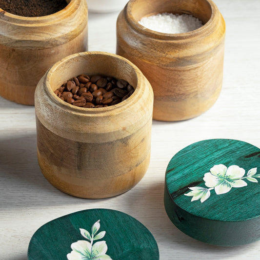 Coffee beans in small wooden jar