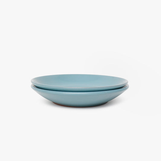 Two blue salad plates