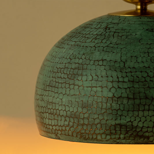 Close up of a Kalash brass hanging lamp
