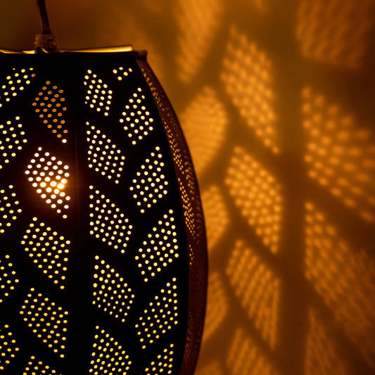 close up of a iron black hanging lamp