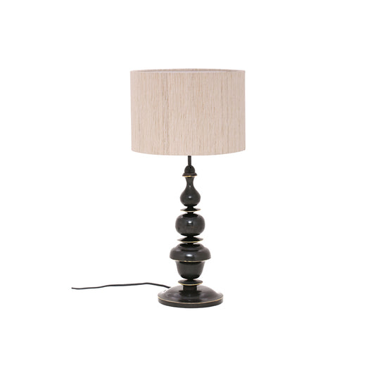 Table lamp in brass base with fabric shade