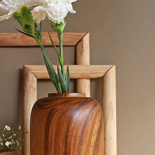Tubular wooden vase close up