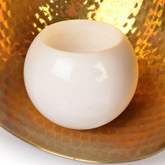 closeup of white marble candle stand
