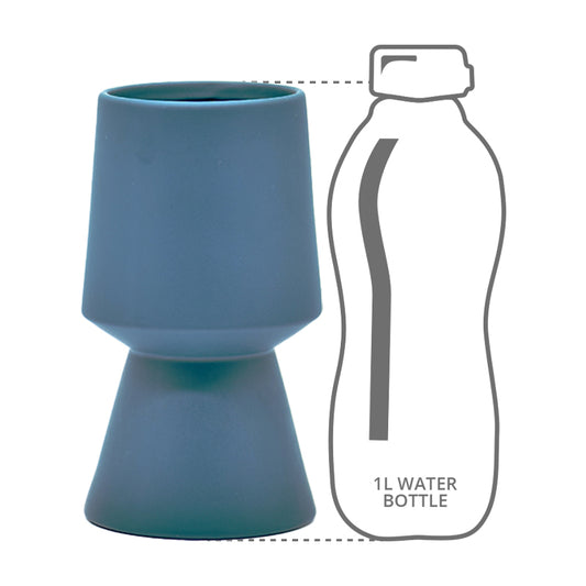 Height comparison of a pedestal charcoal black vase to a 1l bottle