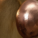 close up of a tava brass wall lamp