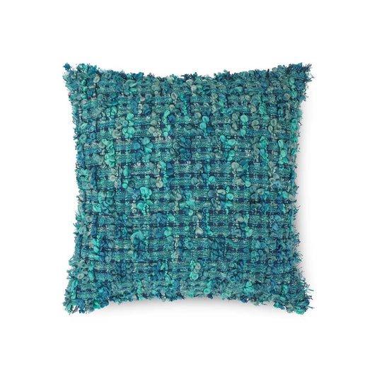 Fringed cushion in turquoise