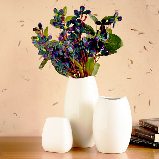 Three neck flower vases in different sizes
