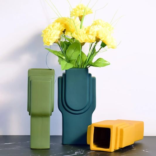 Three square mix vases in different colours